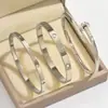 Conjunto de Pulseras de Acero Inoxidable Doradas Transfronterizas con Clavos de Diamante Pulsera de Trébol de Cuatro Hojas Cintura Pequeña Brazaletes Dorados