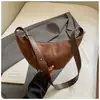 Bolso único de cuerno con textura mate para mujer, nuevo bolso de hombro y cruzado versátil de gamuza vintage de alta gama 2026