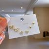 Pendientes de una semana de pequeño lujo de alta gama, juego de seis piezas con aguja de plata S925, combinación con pendientes pequeños para mujer