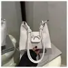Bolsa Feminina Casual de Grande Capacidade 2025 Nova Cor Pura Moda Estilo Coreano Laço Simples Uma Alça Transversal Axila