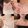 Joias de pingente, pérolas da moda, acessórios de corrente para clavícula de aço titânio de luxo de alta qualidade, colar versátil de nicho com borboleta atacado