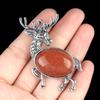Broche colgante de aleación 1934 con incrustaciones de cristal natural semiprecioso de alce, pins de moda europea y americana, suministro transfronterizo