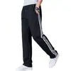 Pantalones deportivos para hombre de cintura elástica para primavera y otoño para el trabajo holgados diarios largos rectos tres rayas pantalones casuales hombre