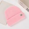 Gorro de punto japonés con logo de cara sonriente gorro de lana para mujer otoño e invierno lindo moderno combinable protección para las orejas negro a prueba de frío fino