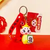 2025 Año de la Serpiente Tendencia Nacional Creativo Pequeña Serpiente de la Suerte Llavero Caja de Regalo Lindo Bolso Llavero Colgante Venta al por Mayor Pequeños Regalos