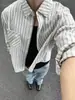 Camisa de rayas seersucker para hombre y mujer, camisa de manga larga de moda de primavera y otoño de alto nivel intelectual, chaqueta de estilo americano de corte limpio