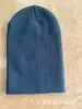 Chapéu de tricô quente para outono e inverno feminino, combina com tudo, leve, liso, cor sólida, chapéu de lã acrílica, chapéu de tricô estilo coreano masculino, atacado de fábrica