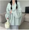 Suéter suave de punto trenzado glutinoso con cuello en V para mujer, otoño e invierno, nuevo, suelto, prenda exterior, estilo perezoso, sentido del diseño, suéter de punto nicho