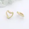 Pendientes versátiles de temperamento de alta gama estilo Hepburn de Instagram pendientes en forma de corazón pendientes de botón de corazón tridimensionales exquisitos a la moda simples