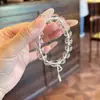 Pulsera de Cristal Blanco Imitación Transparente Hielo de Lujo Ligero de 10 mm con Lazo Microincrustado para Mujer Pulsera Fresca Elegante de Verano