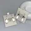 23 moda europeia e americana novo estilo francês simples personalidade geométrica textura metálica brincos brincos de gota d'água transparentes gancho de orelha
