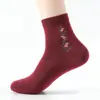 Meias de comprimento médio para mulheres Primavera e Outono meias de mãe para pessoas de meia-idade esportivas quentes folgadas boca larga absorventes de suor moda