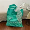 Bolso de Lona de Moda de Nicho 2026 Primavera Nuevo Estilo con Letras para Viajar con Estilo Gran Capacidad Bolso de Hombro Bolso Ligero