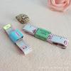 D143D soft tape measure +10 soft tape measure soft tape measure 2 yuan atacado loja de departamentos atacado Yiwu 2 yuan
