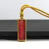 Venta al por mayor del fabricante Arena Mineral Pintada a Mano Acero de Titanio Thangka Zaki Lamu Amarillo Riqueza Mineral Pequeño Thangka Portátil Buda Amuleto Colgante Collar