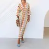 2026 Roupa Feminina Transfronteiriça Europeia e Americana Novo Estilo Comércio Exterior Elegante Fashionável Temperamento Estampada Decote V Plissada Justa Vestido
