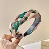 Diadema vintage de lunares plisada de ala ancha para mujer, casual y única, con un toque de alta gama, diadema versátil que hace que la cabeza se vea más alta y el rostro parezca más pequeño
