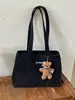 Bolso grande estilo universitario para mujer 2025 nueva moda versátil de un solo hombro simple para clase y desplazamientos bolso tote