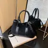 Bolso de Mano Pequeño Casual para Mujer Pedido Extranjero Otoño e Invierno 2026 Nueva Moda Bolso Tote Versátil Bolso Cruzado tipo Cubo para Viajes