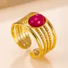 Estilo europeo y americano, anillo ligero de acero inoxidable de lujo para mujer, con un diseño bohemio de múltiples hilos, una piedra natural de forma ovalada y un acabado hecho a mano.
