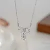Corrente Elegante para Clavícula Banhada a Ouro Real com Zircônias Microcravejadas Design de Nicho Feminino Colar com Pingente de Borla e Laço Colar de Luxo Acessível