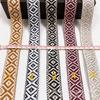 Fábrica en stock 2.5CM estilo nacional cinta de diamante jacquard por computadora cinta de poliéster bicolor de doble cara accesorios