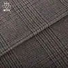 Tejido de lana lisa de una cara a cuadros marrones, mezcla 50% lana. Fabricante de telas para abrigos de otoño e invierno suministra tela de lana de una cara