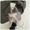 Outono de 2026 Novo Estilo Coreano Nicho Alto Valor Moderno Simples para o Dia a Dia Bolsa Pequena Feminina Transversal Quadrada Pequena