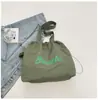 Bolso de hombro de gran capacidad estilo coreano con estampado de letras para mujer, nuevo bolso tote casual de moda 2026 con asa de cordón