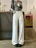 Jeans de corte recto, tridimensional, estilo coreano para mujer, con bordado de bolsillo otoño/invierno, un diseño moderno y estilizado, y un versátil estilo de cintura alta y pierna larga.