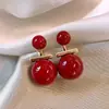 Brincos vermelhos perolados de duas peças Ano Novo brincos temperamento feminino joia de orelha ano de nascimento
