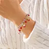 Pulseira de Natal Transfronteiriça Nova Papai Noel Sino Vermelho e Verde Saco da Sorte Floco de Neve Alce Boneco de Neve Corrente Dourada e Prateada