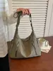Bolso nuevo para mujer 2026 transfronterizo, bolso de gran capacidad moderno para estudiantes universitarios, bolso de hombro y cruzado de moda para ir al trabajo