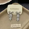 Pendientes de Zirconia con Lazo Estilo Francés Pendientes Únicos Moda 2026 Diseño Personalizado Pendientes de Gama Alta para Mujer