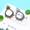 Accesorios de joyería al por mayor NIANXING aleación pendientes de flor en forma de gota cabeza colgante accesorios étnicos hechos a mano