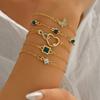 Pulsera de Diamante con Figura de Ocho de Amor Hueca de Venta Caliente Transfronteriza Europea y Americana Pulsera de Múltiples Piezas de Lujo Ligero Esmeralda