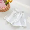 Calças Infantis Verão Estilo Coreano Novas Shorts Casuais para Meninas Calça Saia para Crianças Calças de Cor Sólida Shorts Evasê para Meninas