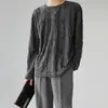Estilo coreano INS diseño de nicho cuello redondo agujero manga larga para hombre y mujer retro desgastado holgado todo-partido top camiseta moda masculina