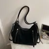 Nueva mochila retro 2026 para mujer, colección otoño/invierno, con un diseño lindo y elegante, gran capacidad, bolso de hombro casual y un bolso tote moderno y minimalista
