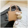 Bolsa de Ombro com Laço para Mulheres 2026 Nova Coleção de Primavera Estilo Simples e Elegante Pequena Bolsa Quadrada Textura de Alta Qualidade Bolsa de Ombro Único Transversal