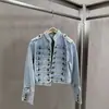 Modelo transfronterizo otoño 2026 nuevo estilo cuello alto pequeño manga larga diseño de doble botonadura estilo retro chaqueta de mezclilla ins