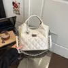 Bolso de hombro versátil de moda transfronterizo con un toque de alta gama, adecuado para ir al trabajo, bolso tipo cubo vintage, bolso de mano acolchado simple casual
