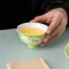 Taza maestra de cerámica de peonía pintada a mano Miyan para mujer, taza de té con forma de flor de pie alto, taza fresca y elegante para degustación de té, taza para beber té, juego de té