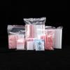 Bolsa Ziplock de Borde Rojo Transparente Bolsas de Embalaje de Plástico Engrosado Impermeable y a Prueba de Humedad Bolsa Sellada Bolsa de Almacenamiento de Hueso de PE Venta al por Mayor