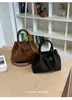 Bolso de mano de alta gama para mujer 2026 nuevo moda de verano versátil bolso de hombro bolso cruzado tipo cubo para el día a día