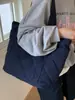 La Bolsa Casual de Gran Capacidad de Moda y Tendencia de Este Año 2025 Nuevo Estilo Coreano Bolso de Hombro Único Bolso Tote de Color Sólido