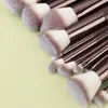 Novo conjunto de pincéis de maquiagem 11 peças cor café transfronteiriço com cerdas macias tricolores, incluindo pincel para base, pincel para sombra, pincel para sobrancelha, pincel para contorno e pincel para pó solto