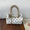 Bolsa feminina de grande capacidade 2026 nova moda bolsa tote de bolinhas para trabalho e deslocamento, bolsa de ombro casual estilosa e única
