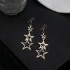 Pendientes de hoja hueca simple transfronterizos europeos y americanos, pendientes de borla larga de estrella de cinco puntas de múltiples capas creativos exagerados al por mayor