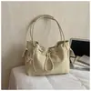 Bolso de hombro plisado de nicho estilo coreano transfronterizo 2026 para mujer, versátil, para el trabajo, bandolera tipo cubo